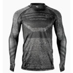Performance black and gray paintball jersey with moisture-wicking fabric, designed for durability and comfort during intense paintball games. Perfect for serious players seeking premium gear.