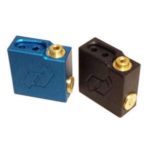 Blue and black paintball regulator blocks with gold accents, designed for optimal performance in paintball tournaments. Premium quality paintball accessories for enthusiasts.