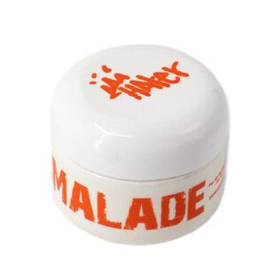 Bright white paintball hopper lid with bold red "Malade" logo for premium paintball accessories and equipment. Durable and eye-catching for paintball game gear.