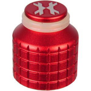 Red aluminum paintball hopper lid with snowflake design, suitable for premium paintball gear and accessories. High-quality paintball equipment for enhanced gameplay and durability.