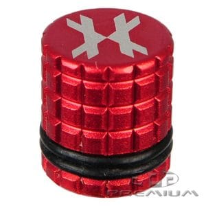 Red paintball fill nipple cover with white logo, designed for paintball markers, durable and easy to install, ideal for paintball equipment accessories.