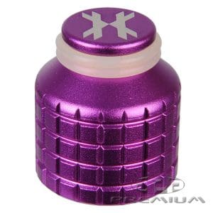 Purple metallic paintball barrel plug with snowflake design for paintball marker safety and customization.